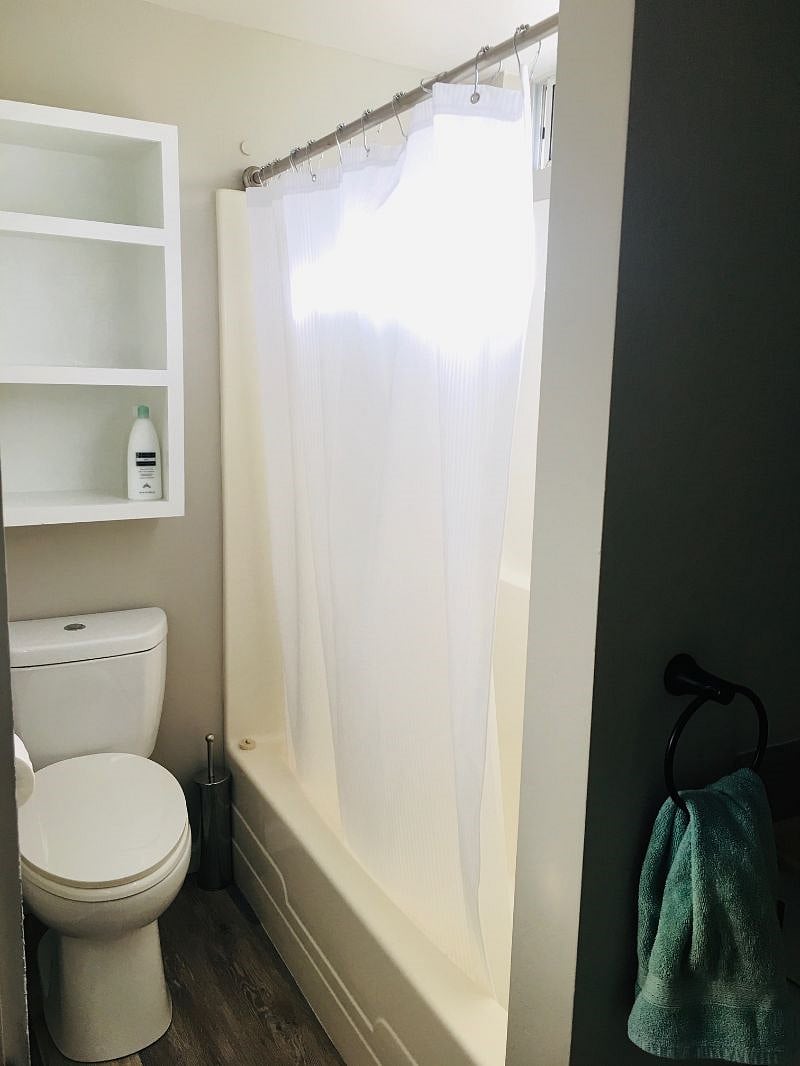 Bathroom with tub/shower.
