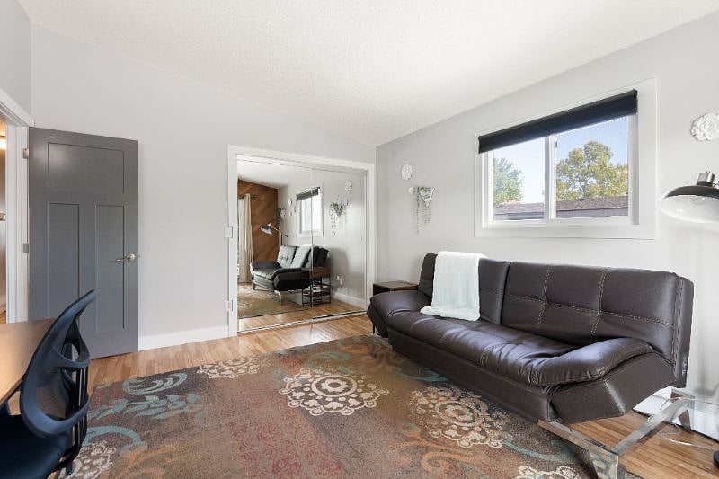 3rd Bedroom,  Multi-function flex space, Office with futon that turns into full size bed. This room has the only access to backyard.  