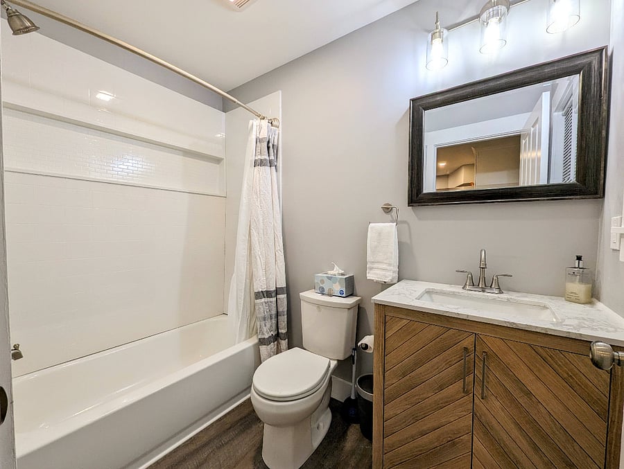 Bathroom with tub/shower.