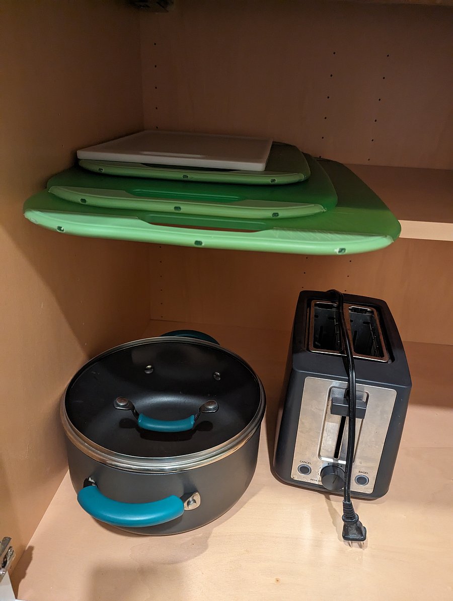 Cutting boards and toaster.