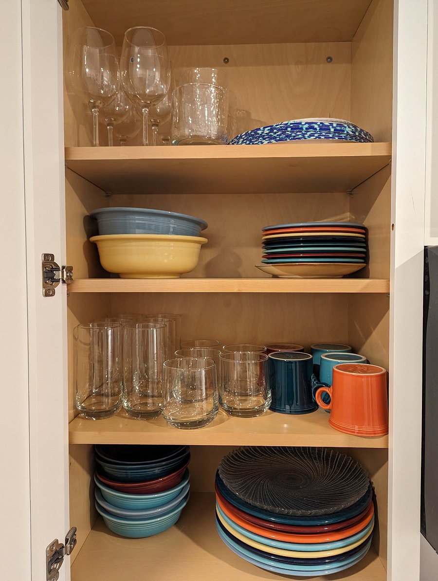 Plenty of plates, bowls, mugs, glasses, cups.