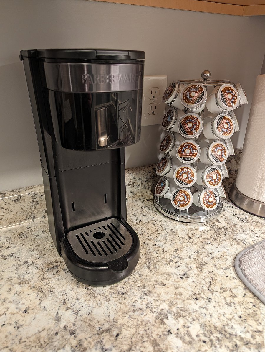 Single-serve coffee brewer that accepts K-Cups and coffee grounds (using the supplied basket in place of the K-Cup adapter).