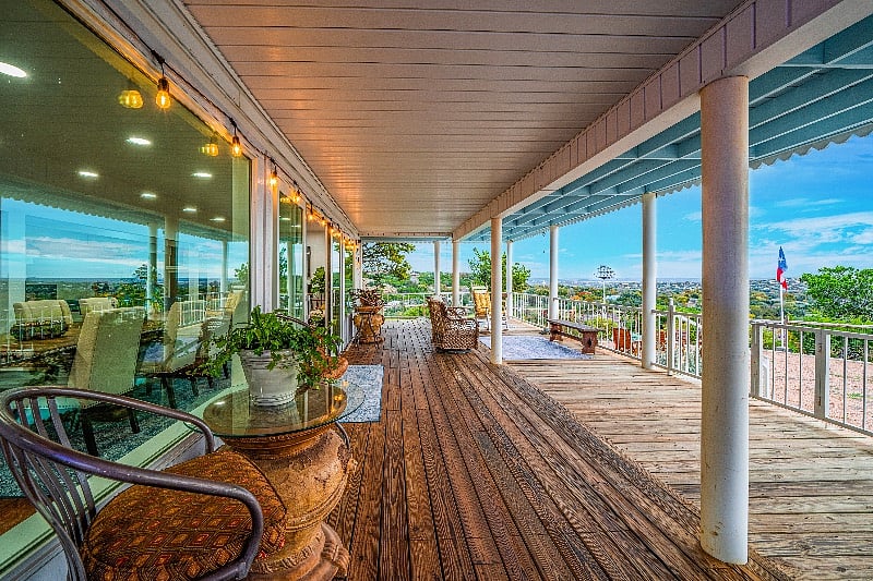 Large downstairs balcony and it a common area! Enjoy the TV while you cook or wash clothes in the large den