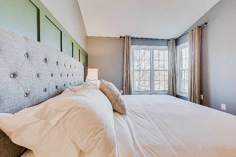LARGE Master bedroom, with a king sized bed. Helix Midnight Mattress, hospitality grade linens, black out curtains