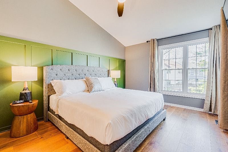 LARGE Master bedroom, with a king sized bed. Helix Midnight Mattress, hospitality grade linens, black out curtains, remote controlled ceiling fan