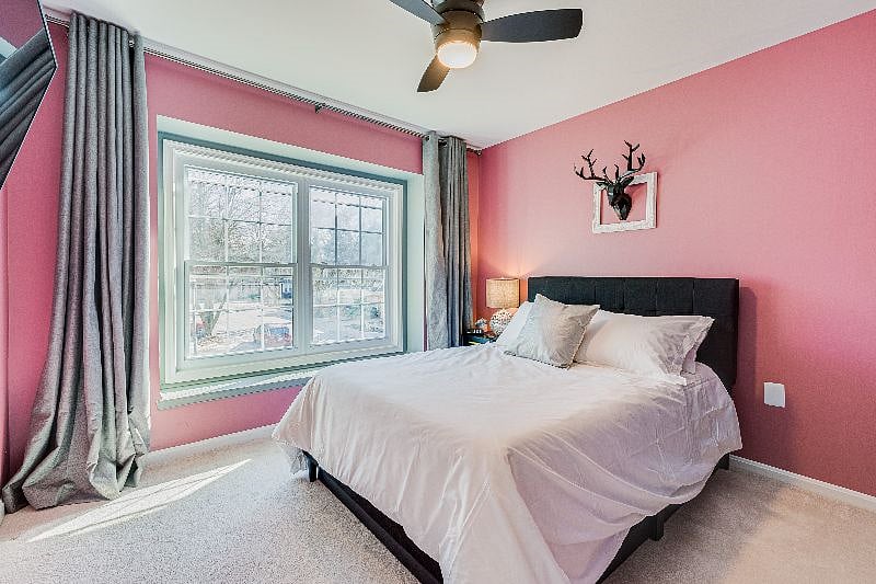 Our Unique "Mauve" Room, w/ a Full sized bed w/ Helix Midnight Mattress, hospitality grade sheets, and a 42" Smart TV