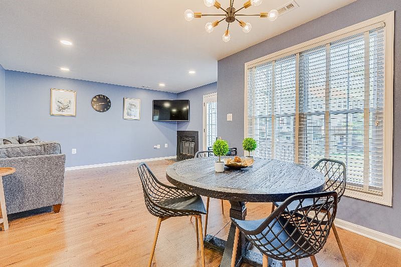 Fully open Kitchen/Dining/Living means the vibe doesn't stop! 55" Smart TV