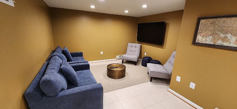 Basement Living with 2x Sleeper Sofas, 70" TV