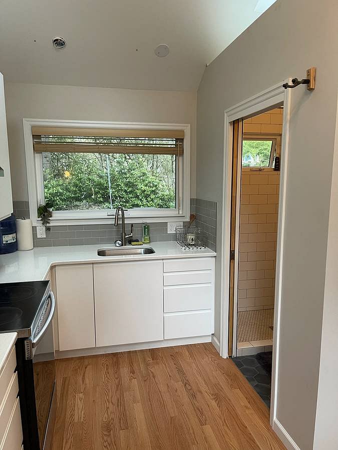 Kitchen with Nearby Bathroom with Pocket Door for Privacy