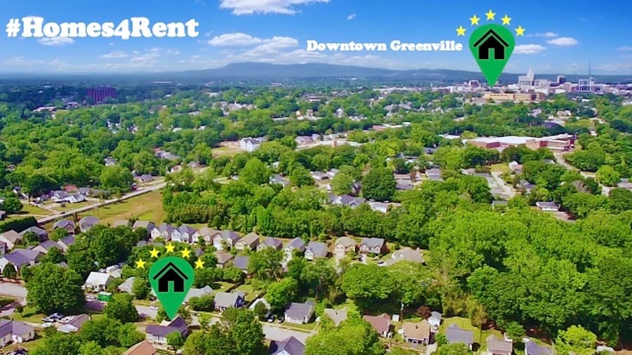 Less than a 10 minute drive to downtown.  Aerial shot of home and downtown GVL.
