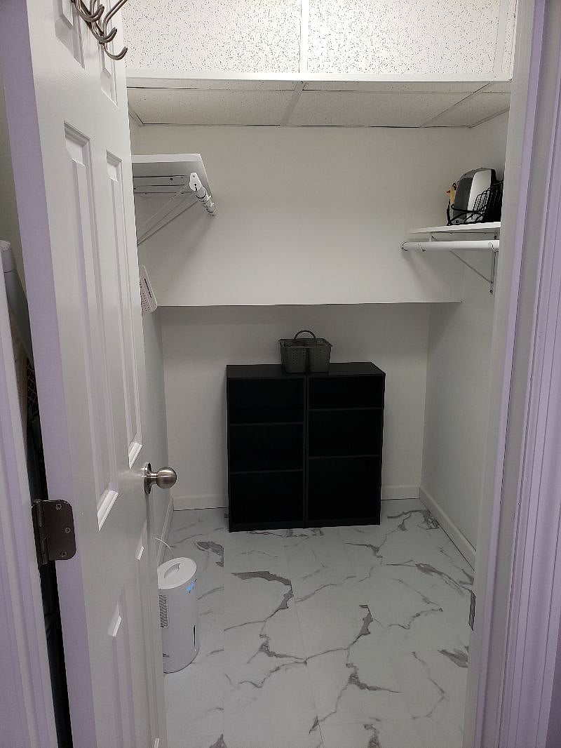 Walk in closet off bathroom