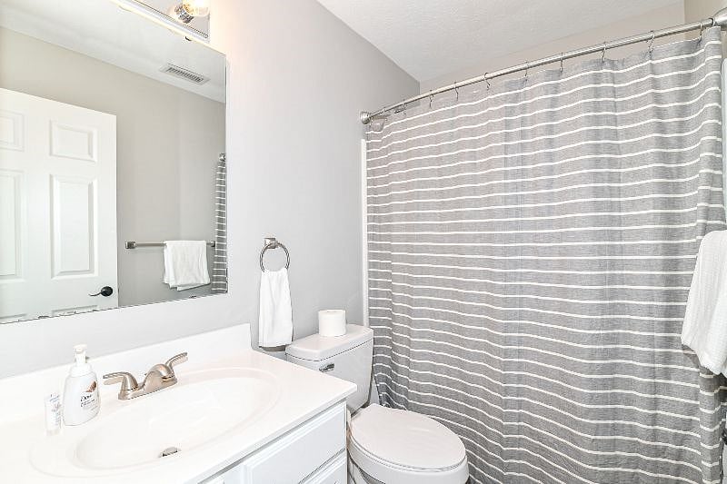 Second full bathroom in hallway next to 2nd and 3rd bedrooms.