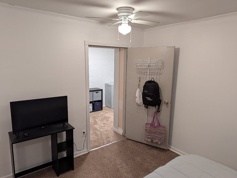 Bedroom looking into closet