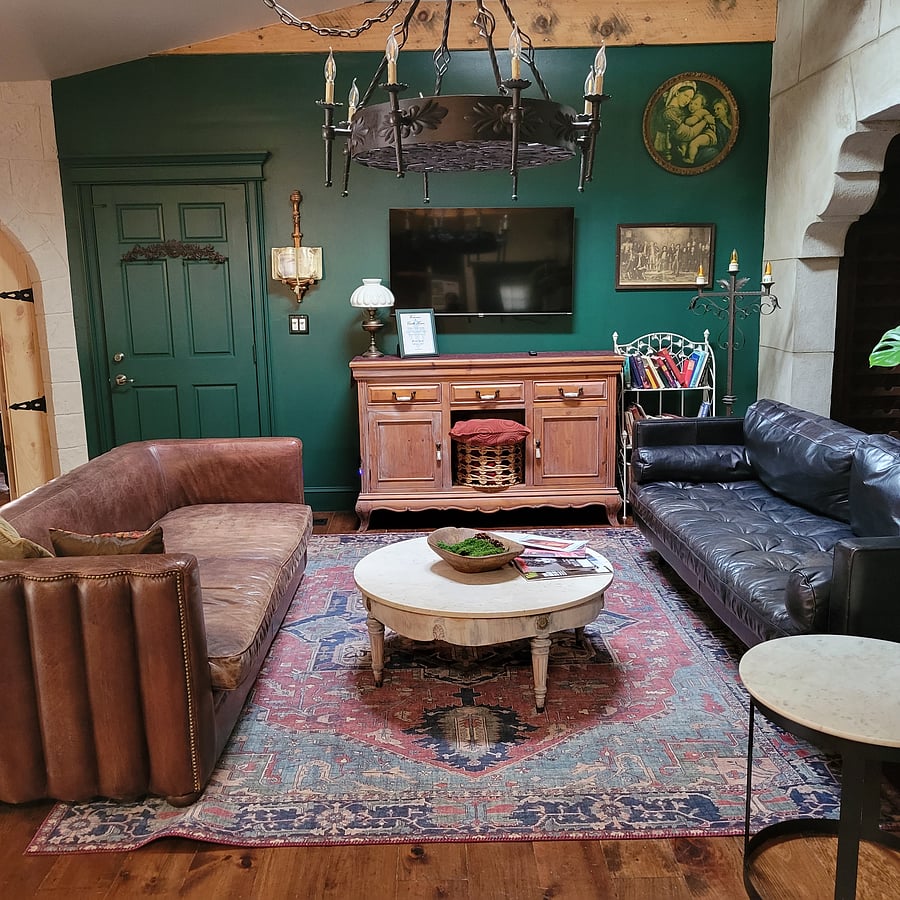 Living room includes a 55 inch smart tv, wifi.  Leather sofas, books and games.