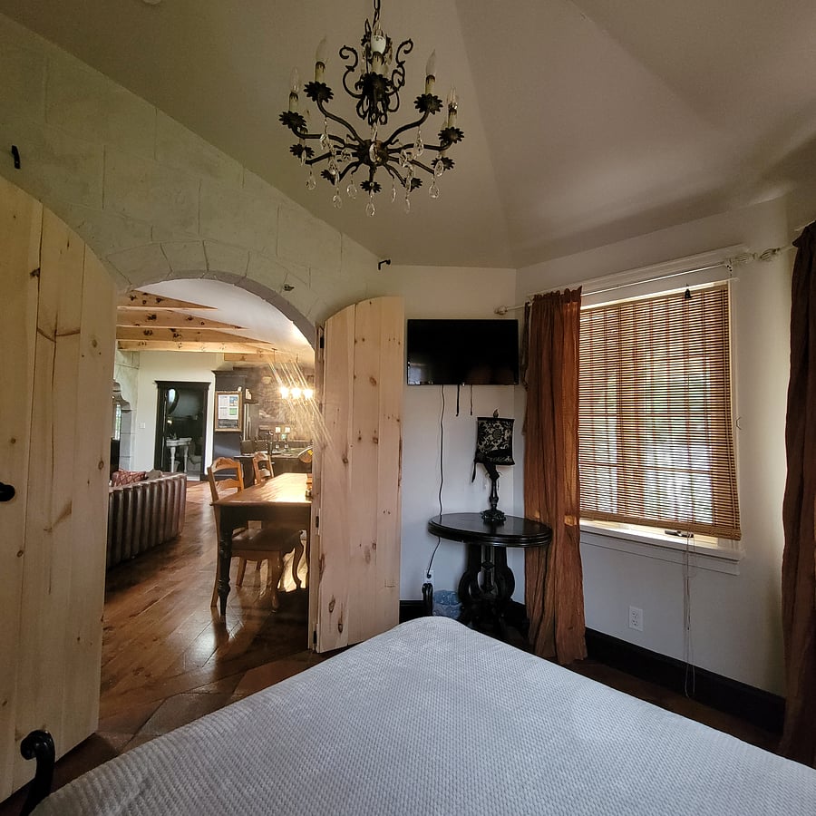 Full size bed includes a tv.