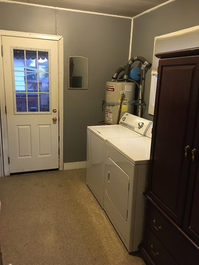 The laundry room features a washer and dryer and plenty of space for clothes and other personal items.