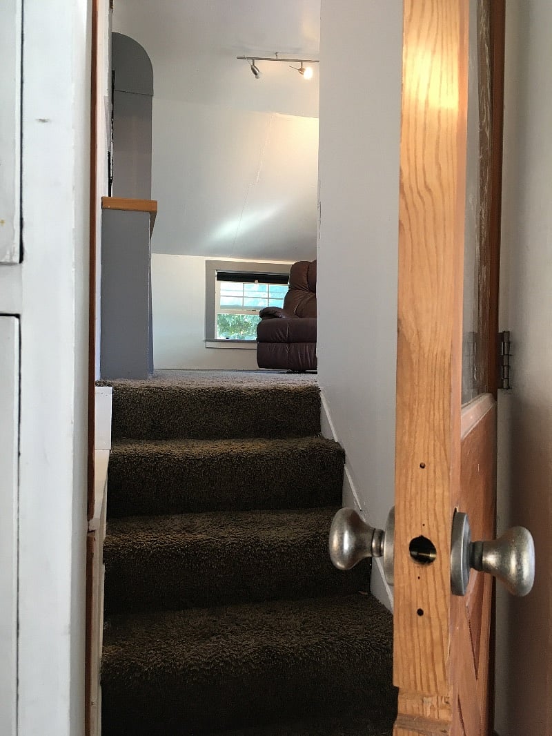 Private door to the lofted third bedroom above the garage.