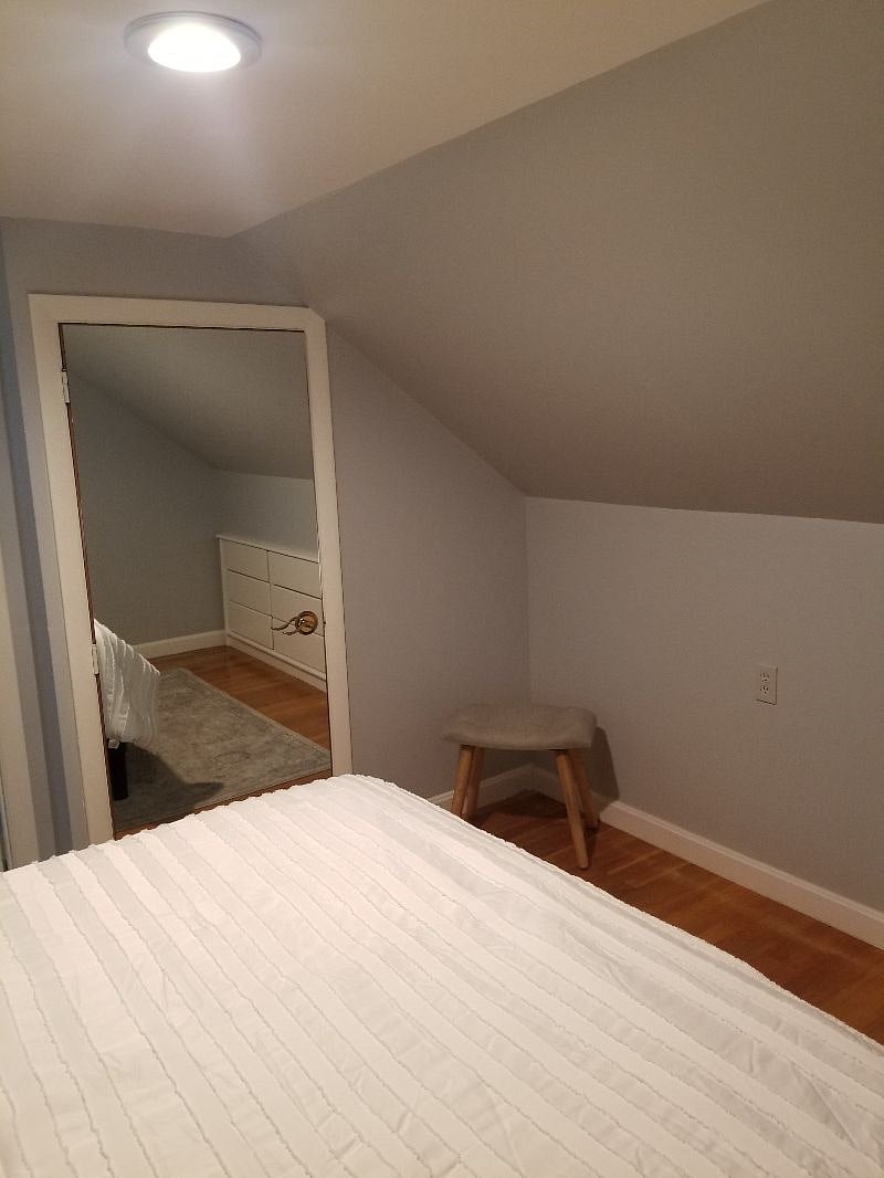 Large mirror on the closet door.