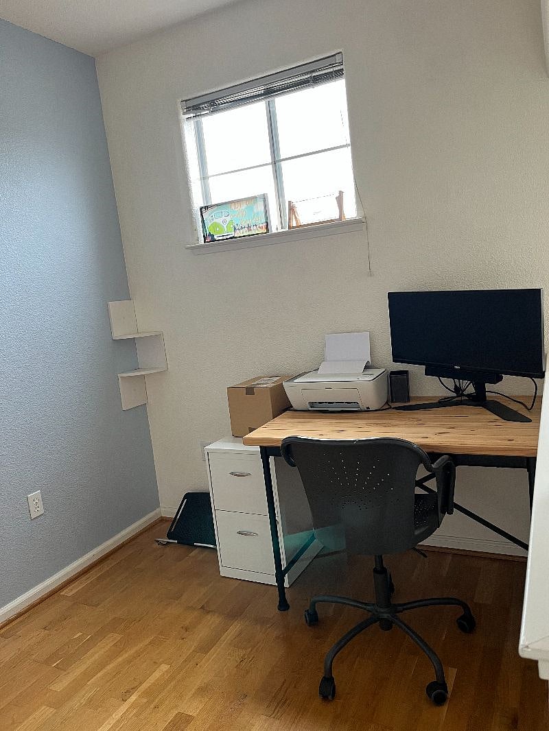Loft with reading chair and desk. Monitor and printer available.
