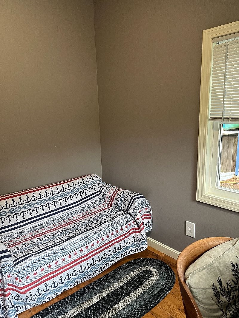 Couch in the home office pulls out into a double bed.