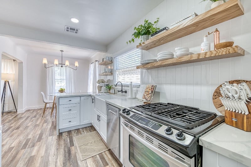 Open shelving for a contemporary feel with gas stove top