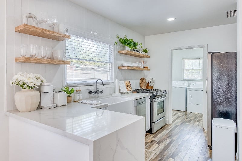 Laundry Room is indoor and just off the kitchen