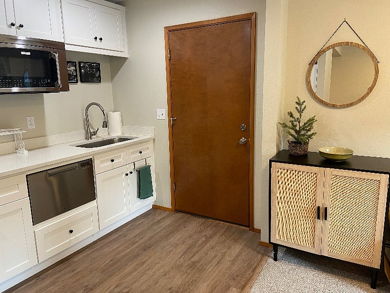 Entrance from garage into kitchenette.