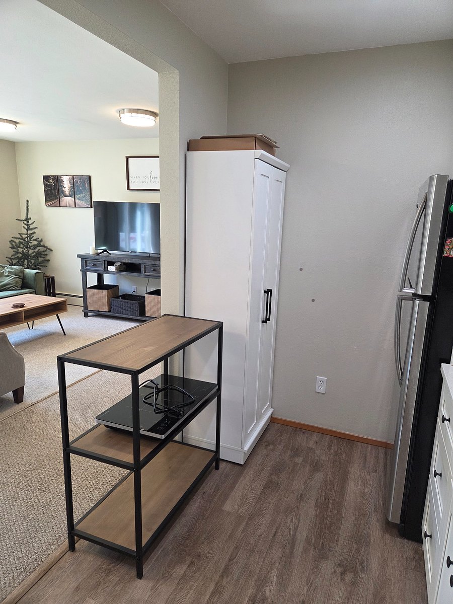 Extra work/cook shelf-island and "pantry" cabinet.