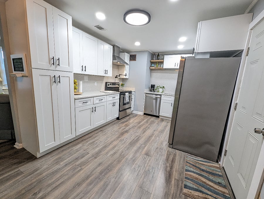 The kitchen has been recently renovated with modern amenities, stainless appliances and a dishwasher