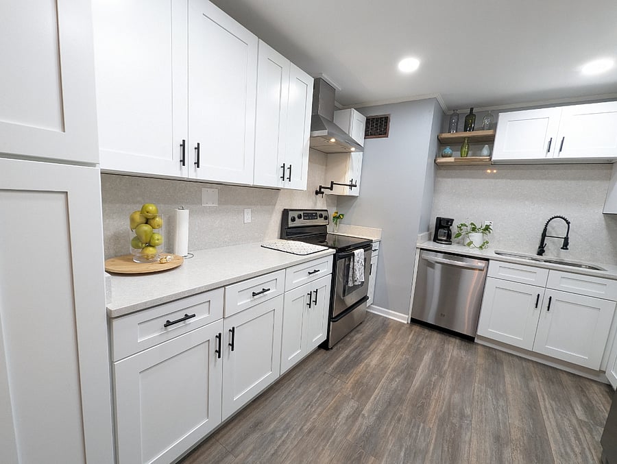 The kitchen has been recently renovated with modern amenities, stainless appliances and a dishwasher
