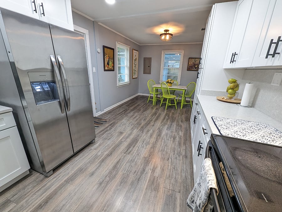 The kitchen has been recently renovated with modern amenities, stainless appliances and a dishwasher