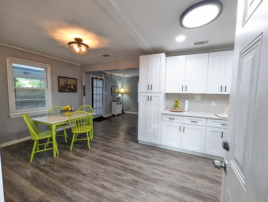 The kitchen has been recently renovated with modern amenities, stainless appliances and a dishwasher