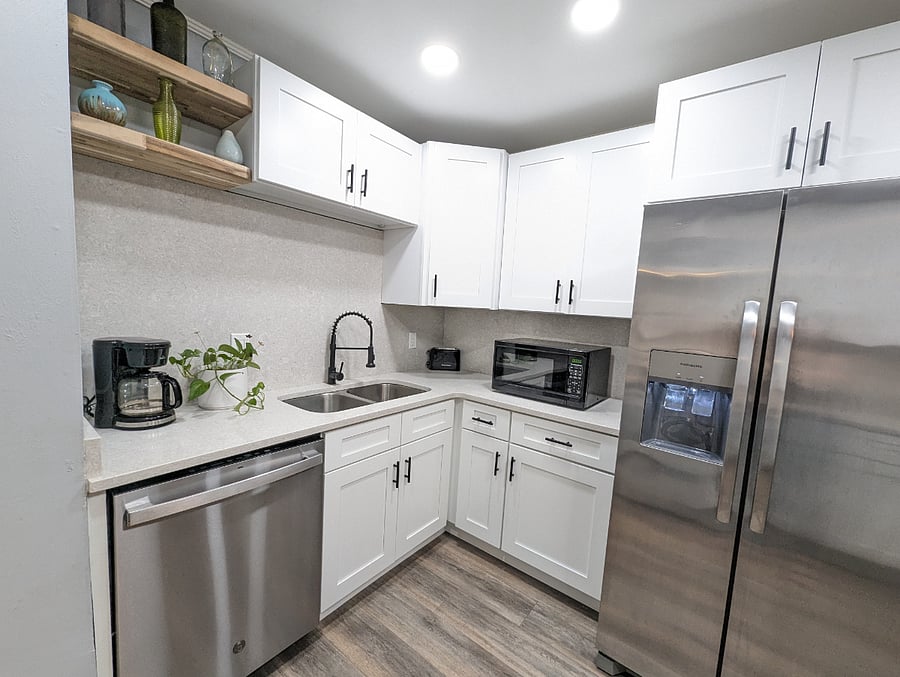 The kitchen has been recently renovated with modern amenities, stainless appliances and a dishwasher