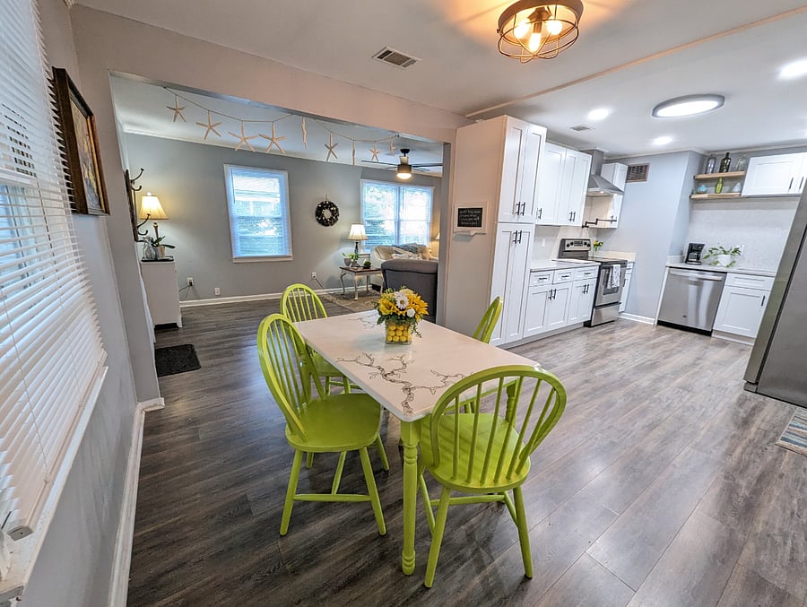 The dining nook is perfect for meals or for a at home work station. Bright and sunny with an open floor plan!