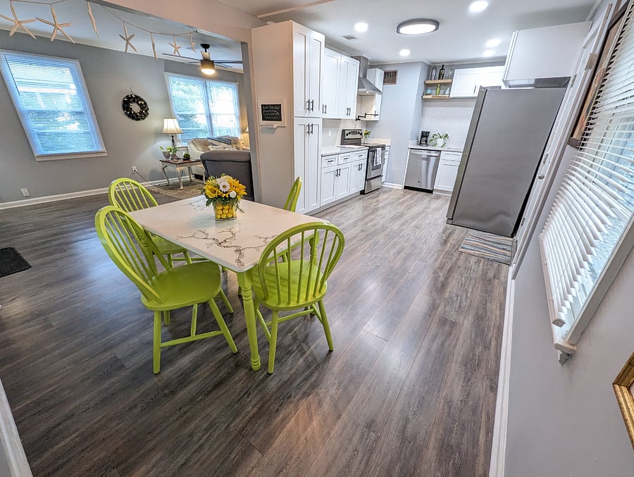 The dining nook is perfect for meals or for a at home work station. Bright and sunny with an open floor plan!