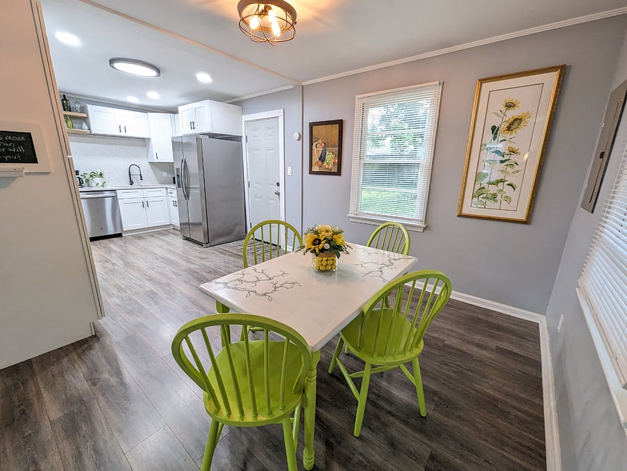 The dining nook is perfect for meals or for a at home work station. Bright and sunny with an open floor plan!
