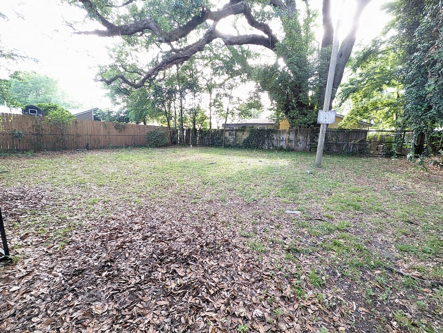 Large, fully fenced yard.