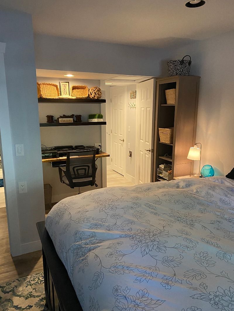 built-in desk area in bedroom, complete with printer in laundry room area.