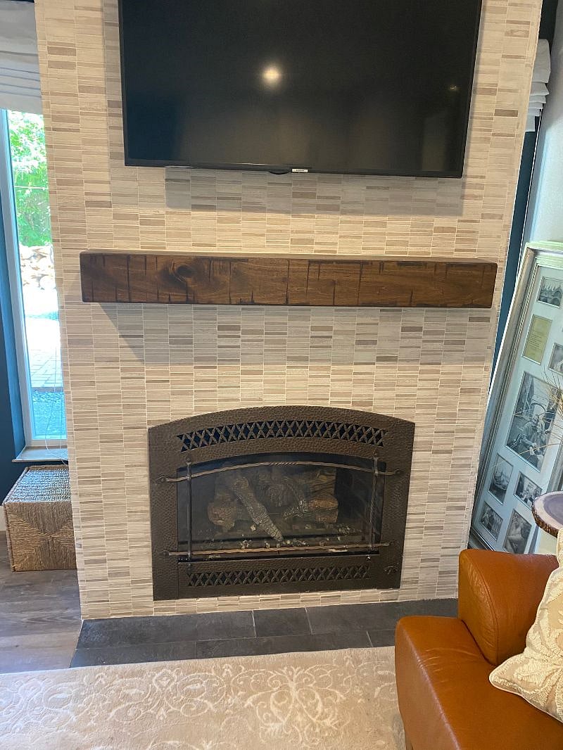 Gas fireplace for supplemental heat or ambiance.