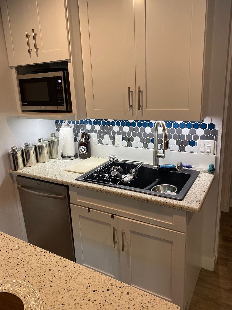Bosch dishwasher, Samsung microwave, double sink with Moen faucet/hand sprayer