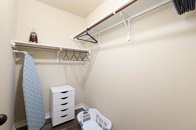 Spacious walk-in closet in the master bedroom