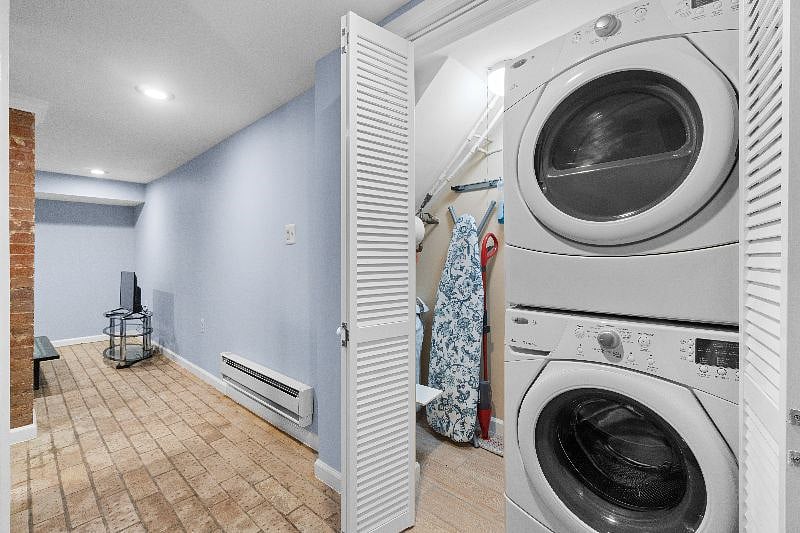 Utility Closet located in the hall between the bedroom & the kitchen & living room areas