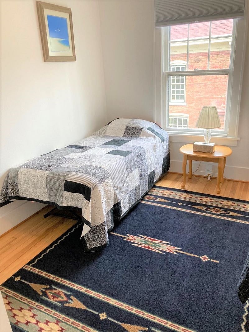 Second bedroom has 2 twin beds. This is the first twin bed. 