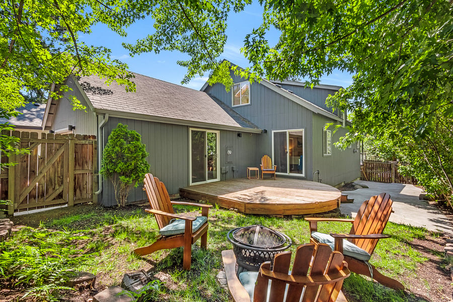 Back deck & yard. Sliding doors in kids room & king bedroom lead to back deck,