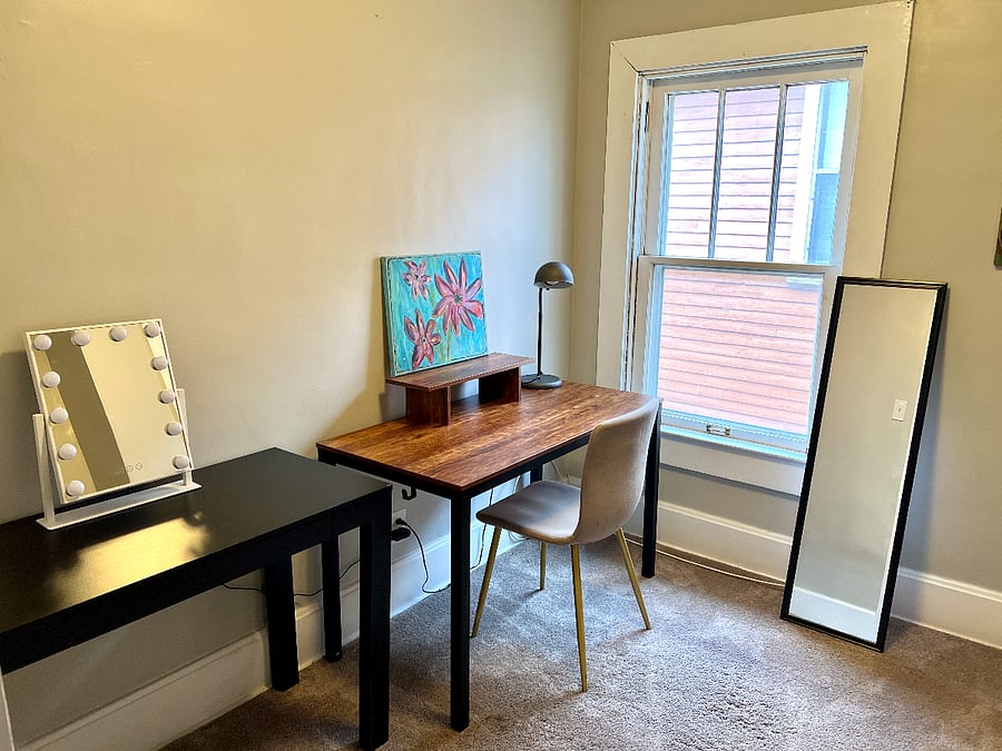 Upstairs. Flexible space for WFH, hair/makeup, or yoga/workouts.