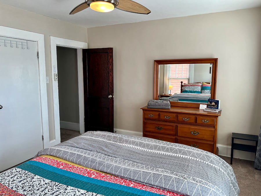 Two dressers plus closet with hangers for plenty of storage.