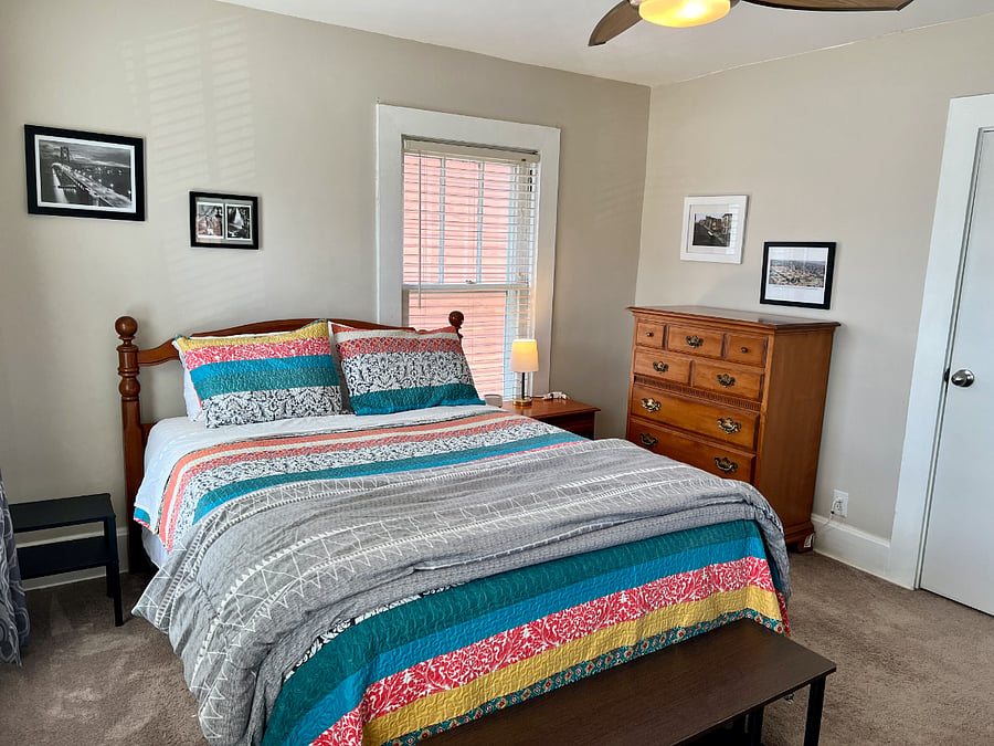 Upstairs. San Francisco room with queen bed and with Serta mattress and 3" foam topper. Blinds on all 3 windows.