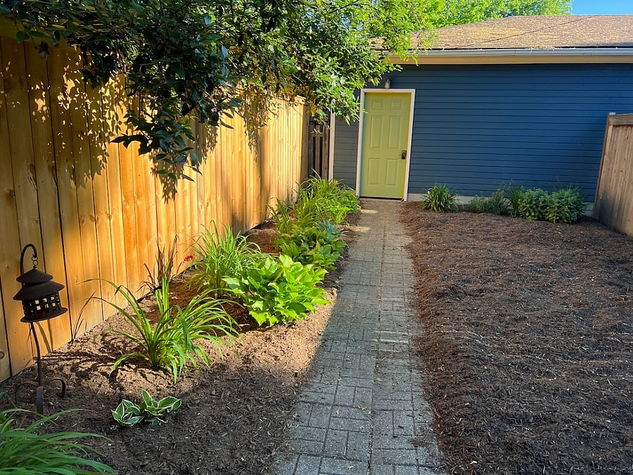 2-car garage with keypad access and fenced yard