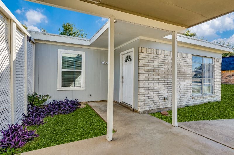Check yourself into this charming, mid-century modern home filled with character.
