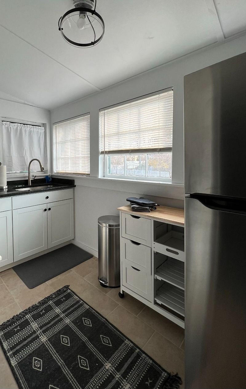 FULL KITCHEN with new appliances - New Oven, New Full size fridge, Microwave, Blender, drip/k cup combo coffee maker, & all the kitchen items you need!